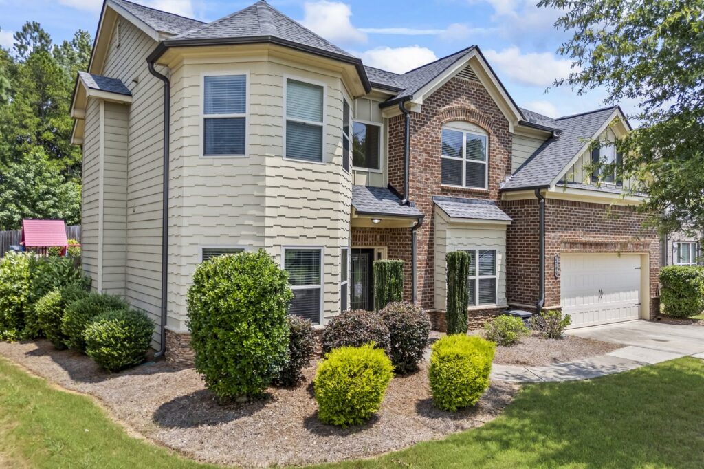 Two story brick and siding home in Northeast Georgia, the kind of house the DreamBuilder program is used to buy